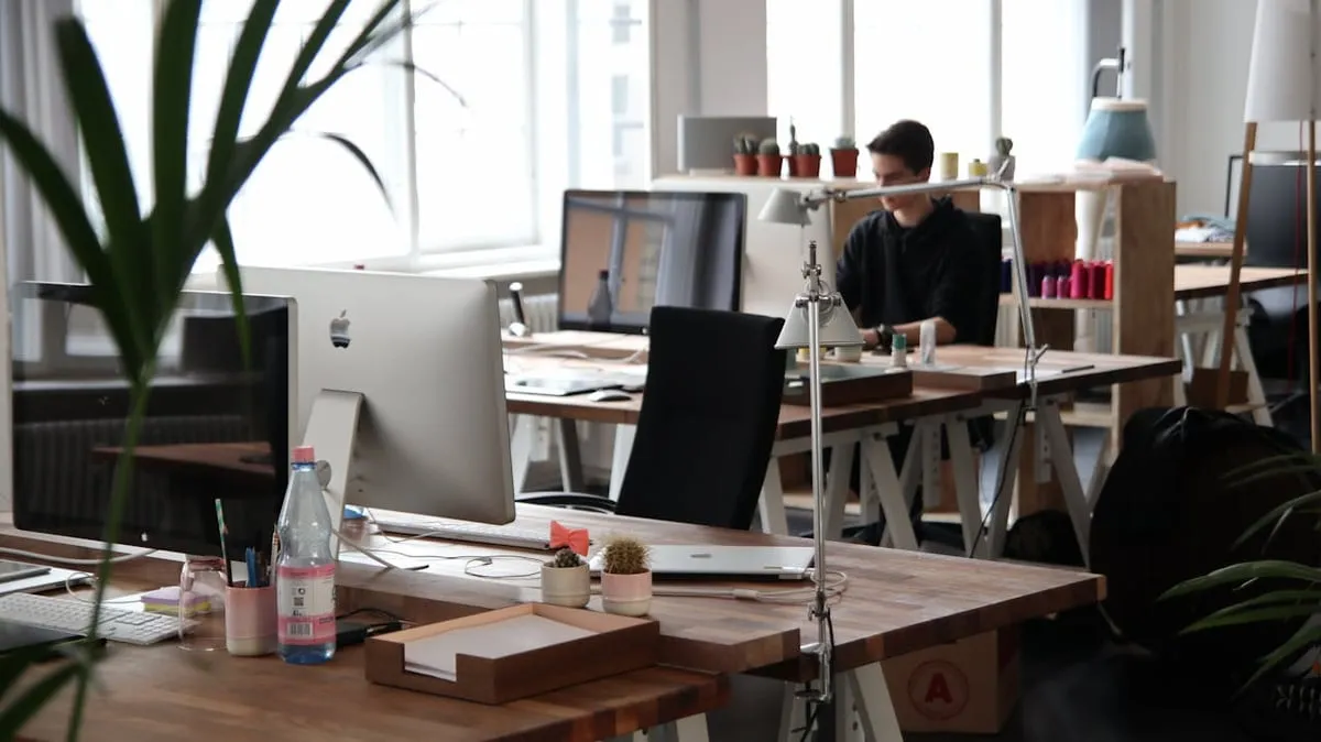 A small open-plan office with a few workstations (illustration photo)